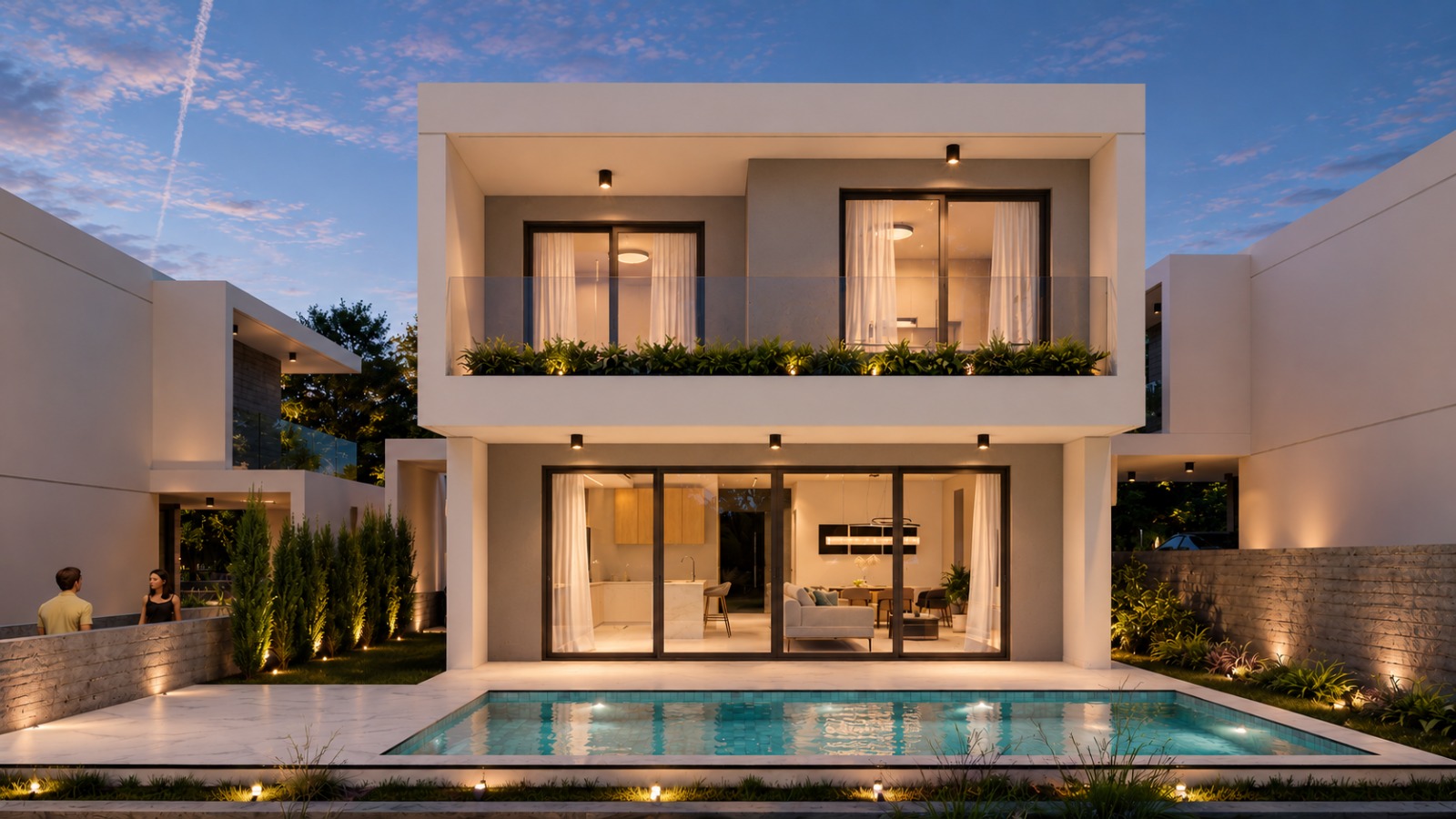 Villa rear elevation with swimming pool at night